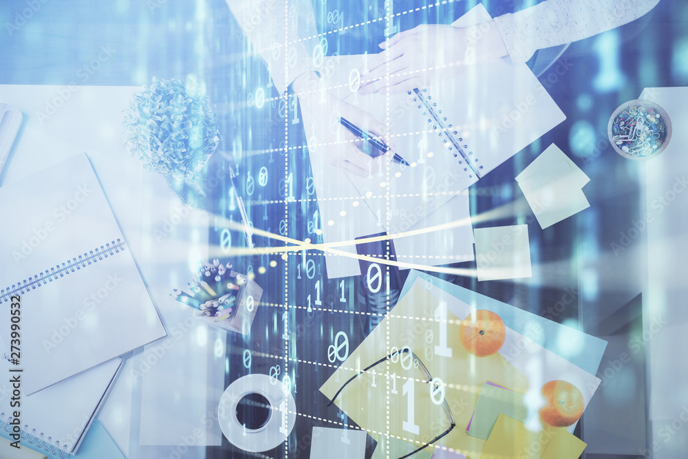 Fototapeta premium Double exposure of writing hand on background with data solution technology hologram. Ai concept.