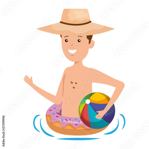 young man with donut float and balloon beach