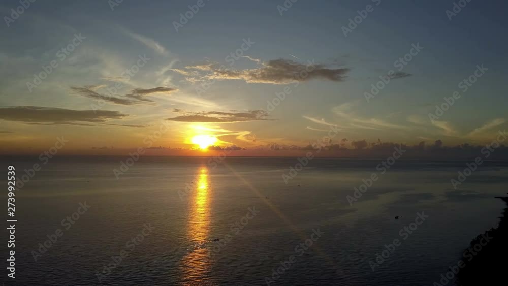 Sunrise on the tropical sea. Aero shooting from the drone