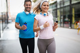 Sporty happy couple exercising together. Sport concept