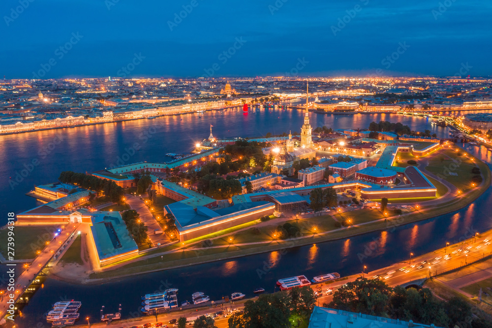 Night view of the Peter and Paul Fortress Hare Island and the city of St. Petersburg.