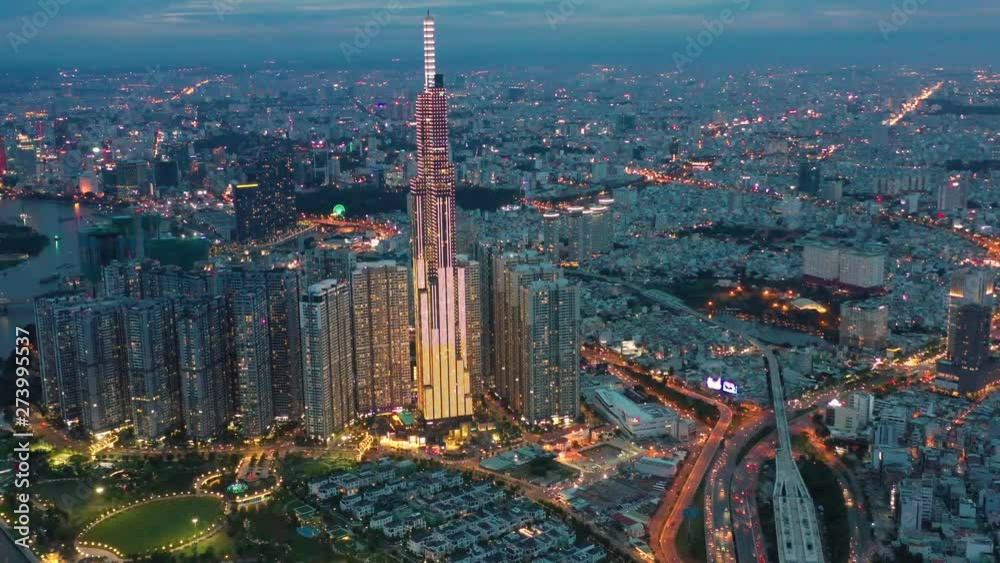 Aerial view of Downtown district of Ho Chi Minh City, aka Saigon, on sunset , including architectural landmark , South Vietnam