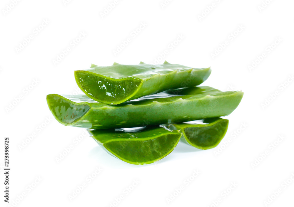 Fresh aloe vera leaves with water drops isolated on white Fresh aloe vera leaves with water drops isolated on white