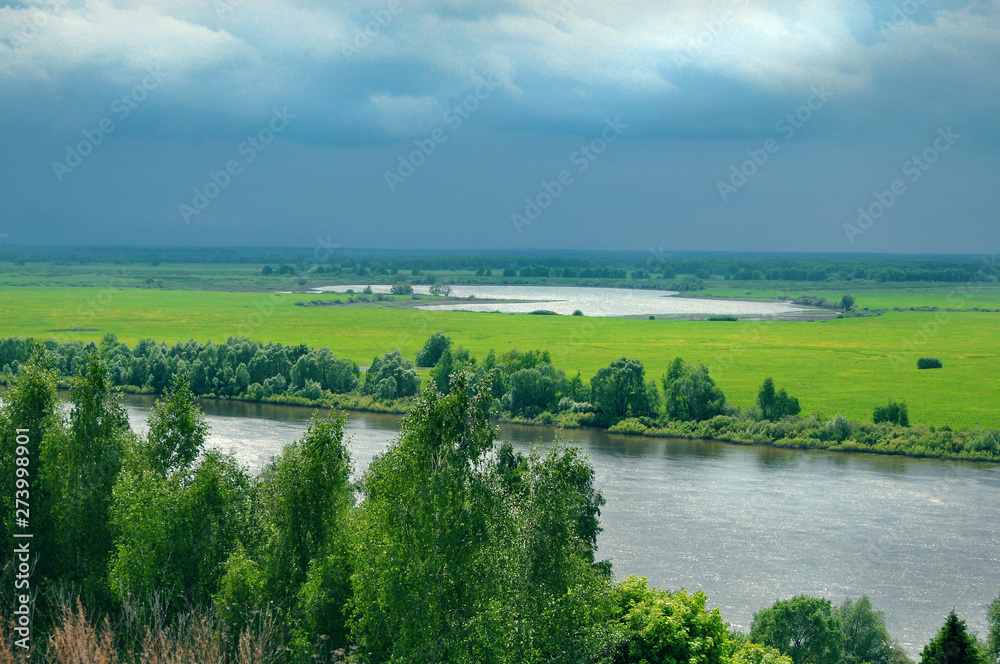 Panoramic views of the natural landscape: the river, the fields, the city