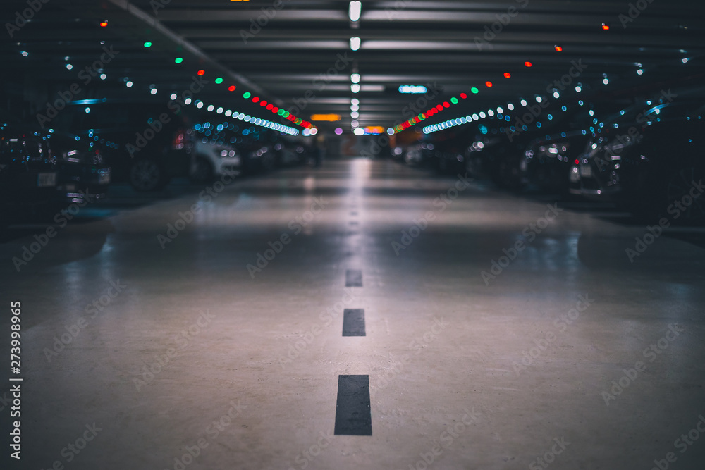 Indoor underground parking lot with blurred background low shot and perspective Indoor underground parking lot with blurred background low shot and perspective