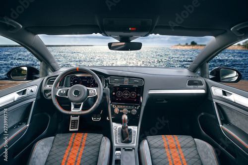 Modern sport car comfortable seats, dashboard and steering wheel © Moose