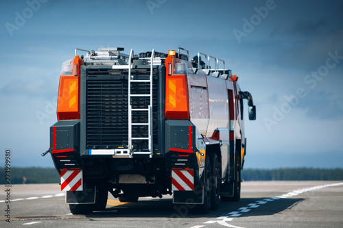 Fotografija Red airfield fire truck at the airport drive fast