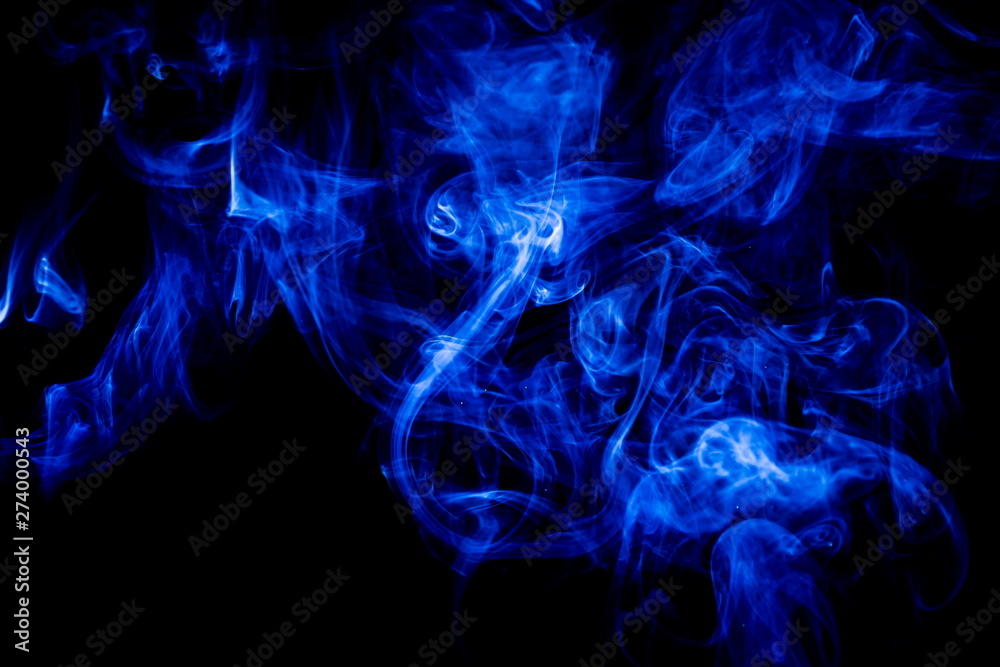 Blue smoke on black background