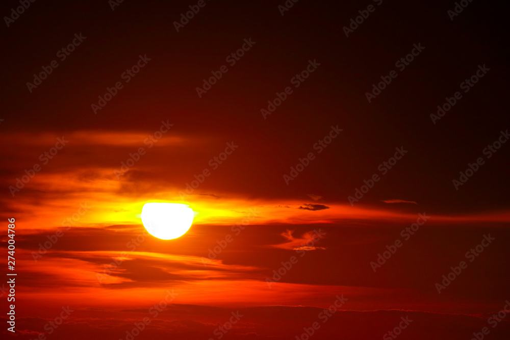 sunset on ocean last light red and orange sky silhouette cloud
