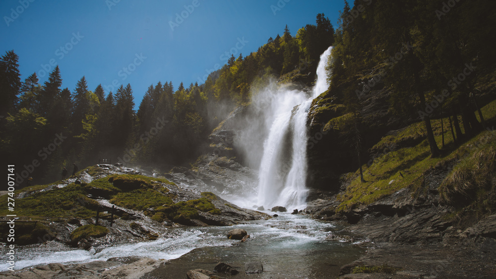 Obraz premium Wild waterfall in summer nature