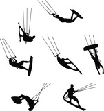 set of silhouettes of kitesurfers, kiteboarding, watersports
