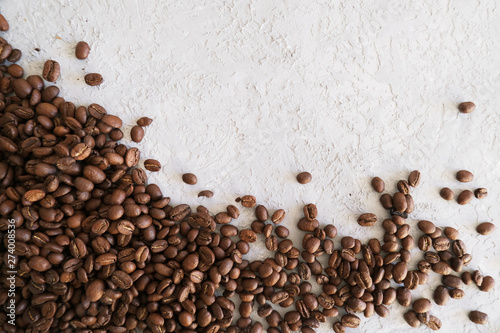 Aroma frame fot text made of coffee beans on gray background with copyspace. Flat lay, top. view. Beverages, morning and cafe concept