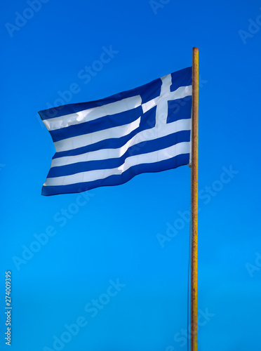 Greek flag waving on clear blue sky