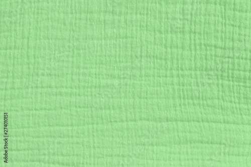 Photos Cotton muslin background in pale green color