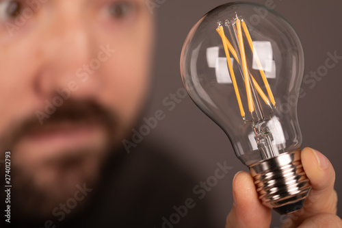 idea lamp concept in hand