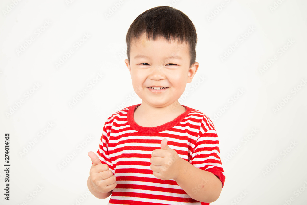 Little Asian boy thump up with happy smile Little Asian boy thump up with happy smile