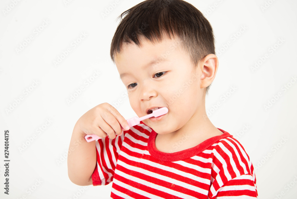 Little Asian toddler boy brushing teeth with happy Little Asian toddler boy brushing teeth with happy