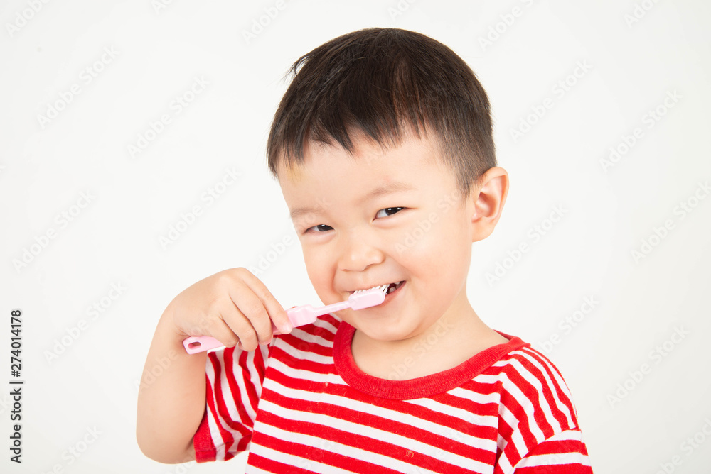 Little Asian toddler boy brushing teeth with happy Little Asian toddler boy brushing teeth with happy