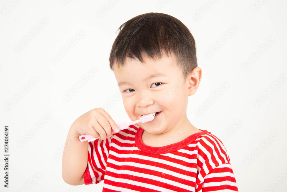 Little Asian toddler boy brushing teeth with happy Little Asian toddler boy brushing teeth with happy