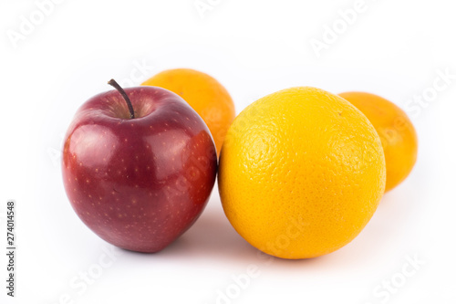 Farm fresh orange and apple on white background