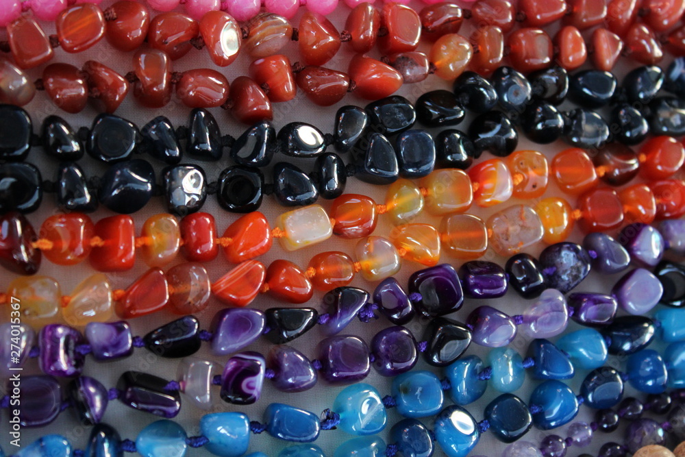 Necklaces of gems of different colors