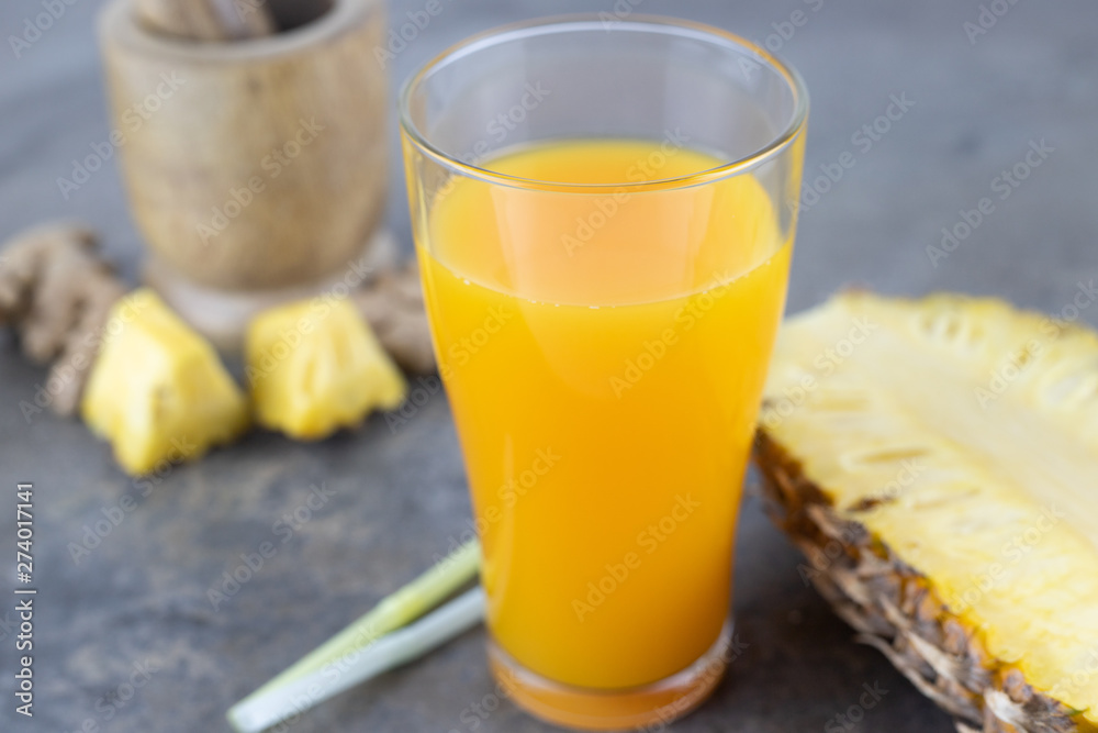 Healthy fresh pineapple juice in a glass. Healthy fresh pineapple juice in a glass.