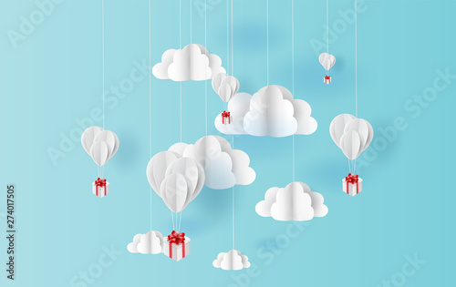 Fototapeta paper art style of white balloons color floating in air blue sky background.Creative design space for Christmas day,Festival,holiday,summer season,springtime.Good idea Pastel color.vector EPS10