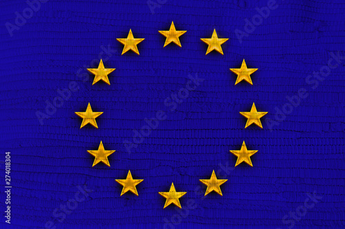 blue EU flag on woven woven fabric texture