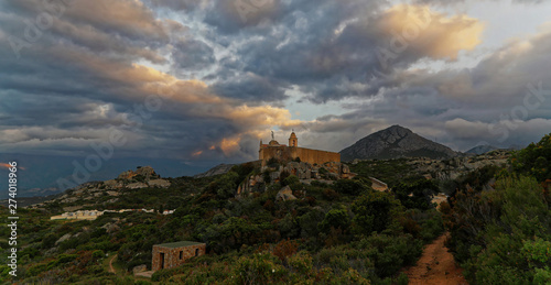 Low wide angle shot of Notre Dame de la Serra Calvi Corsica at sunset