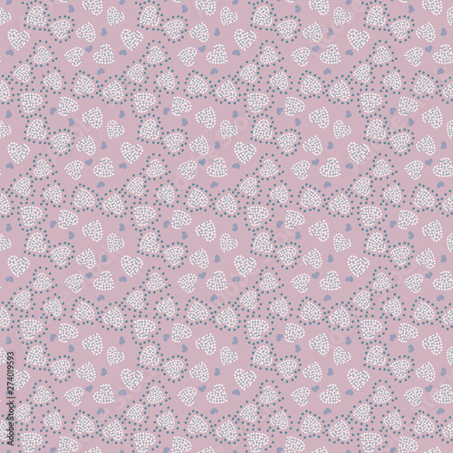 A seamless vector pattern with dotted heart shapes in pastel pinks and greys. Surface print design. Great for weddings and valentines.