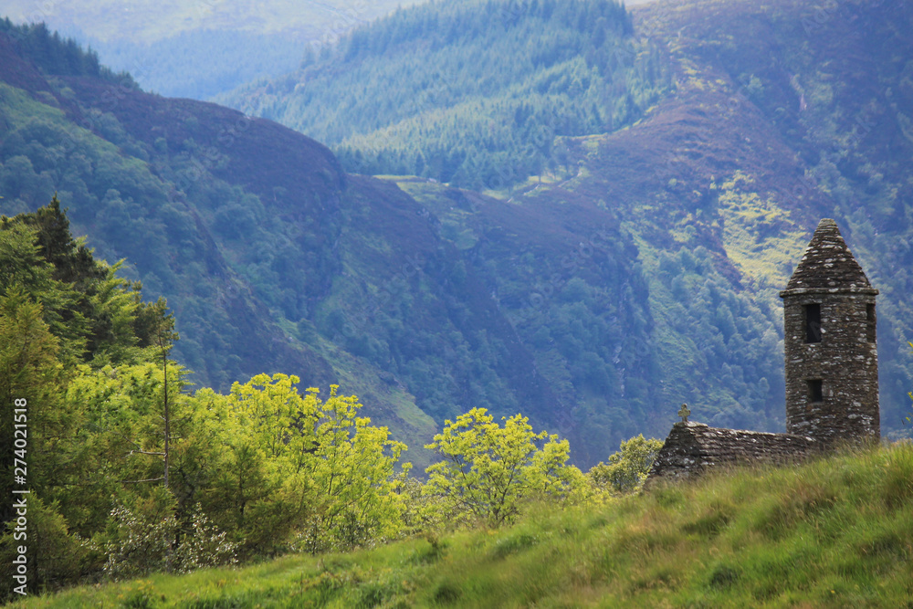 Ancient church tower in a valley in the Wicklow national park