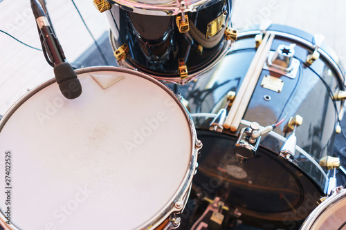 Photography Details of the drum set on the scene close-up.
