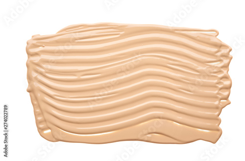 Gently beige strokes and texture of concealer