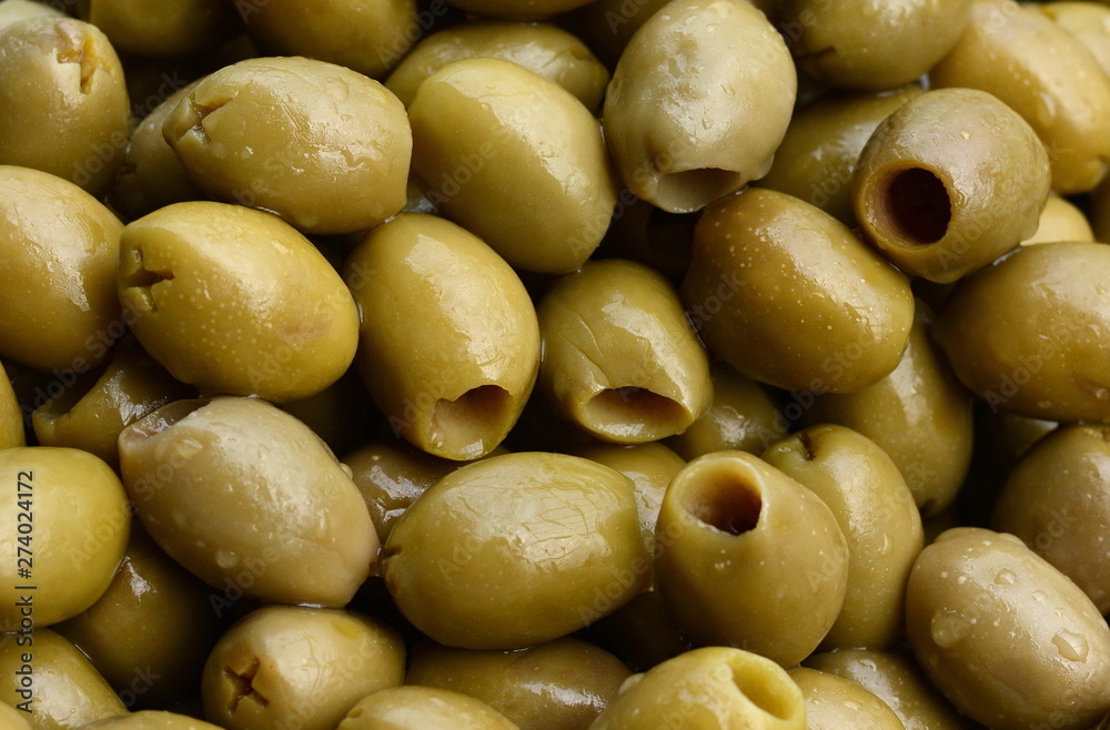 Background of olives close up. Healthy food background. Food concept. Background of olives close up. Healthy food background. Food concept.