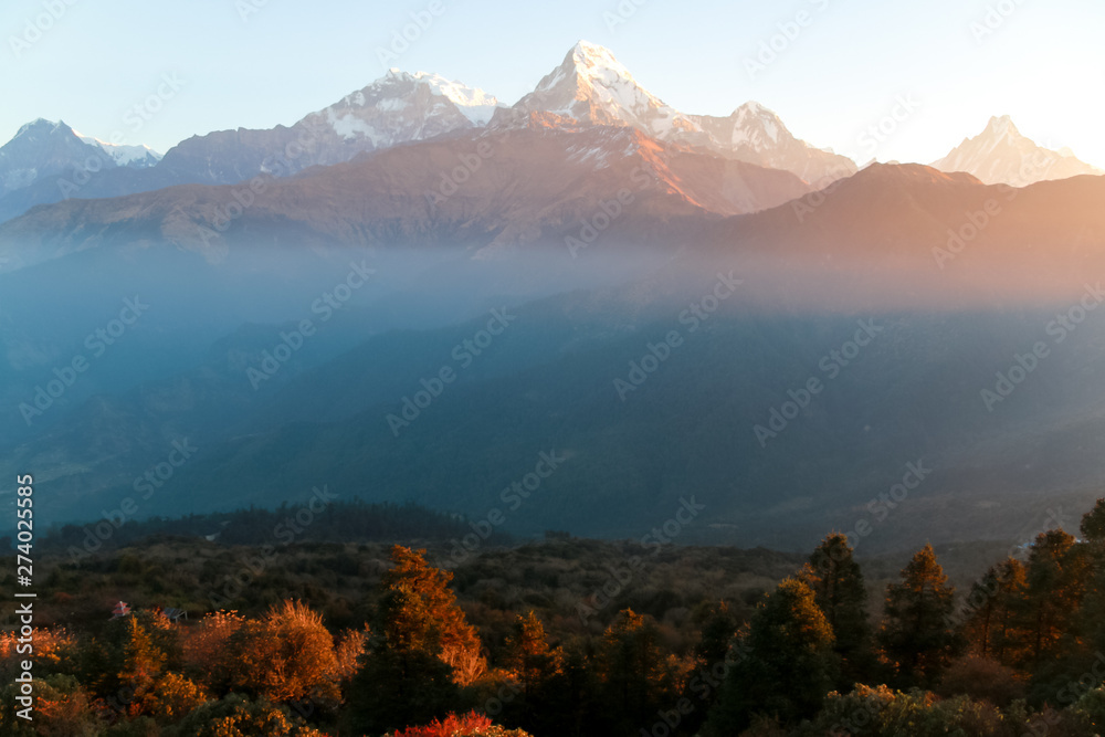 View of the snow-capped Himalayas in Nepal at sunrise