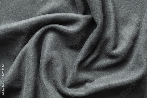 Background texture of dark gray fleece