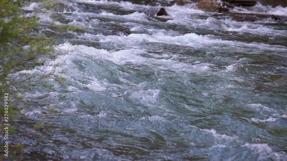 Abounding mountain creek from a Pyrenees mountain in Spain, slow motion footage Abounding mountain creek from a Pyrenees mountain in Spain, slow motion footage