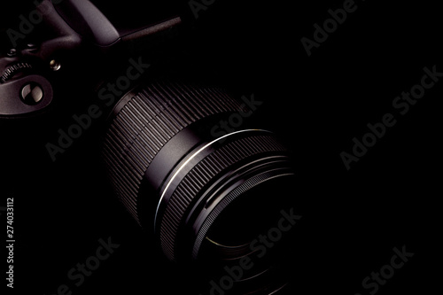 Obraz na plátně Digital SLR Camera on a Black Background