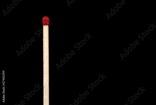 Large Matchstick Isolated on a Black Background
