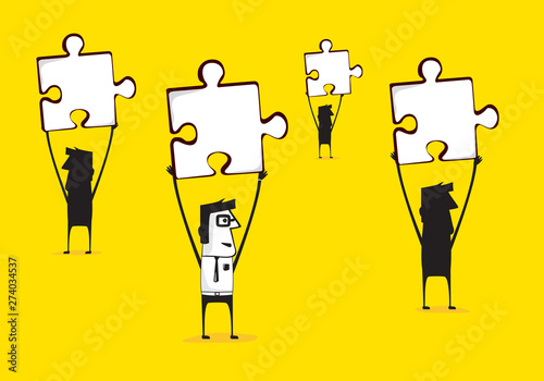 Group holding up a puzzle