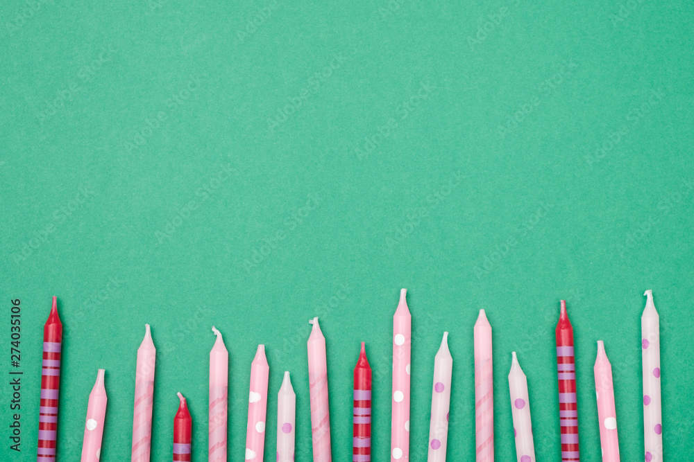 Birthday candles on colorful background. Flat lay Birthday candles on colorful background. Flat lay