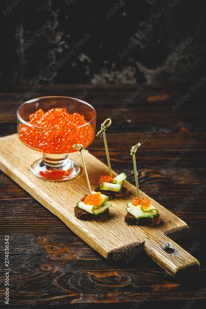 Delicious appetizer with red caviar. Delicious appetizer with red caviar.