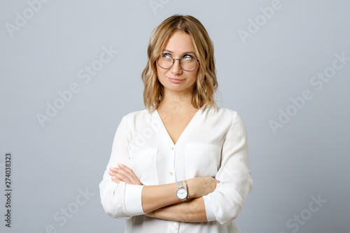 Image of thoughtful nervous young woman isolated