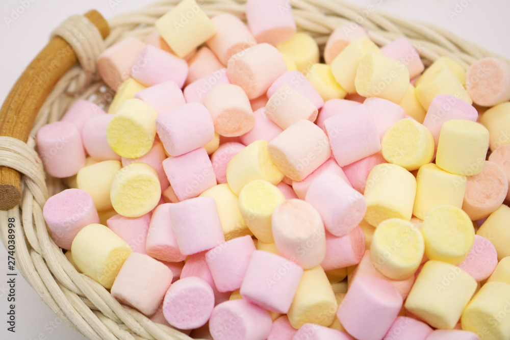 Marmellow air marshmallow close-up on a pink background, pastel colors, light dessert, place for text Marmellow air marshmallow close-up on a pink background, pastel colors, light dessert, place for text