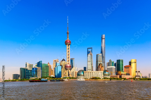 Shanghai finance business district pudong with skyscrapers. Skyline iconic shot during summer sunny day in Shanghai, China.