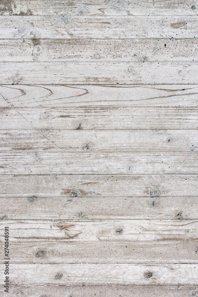 Wall Made of Concrete with Wood Texture / Texture of Wooden Formwork on The Concrete Wall Wall Made of Concrete with Wood Texture / Texture of Wooden Formwork on The Concrete Wall