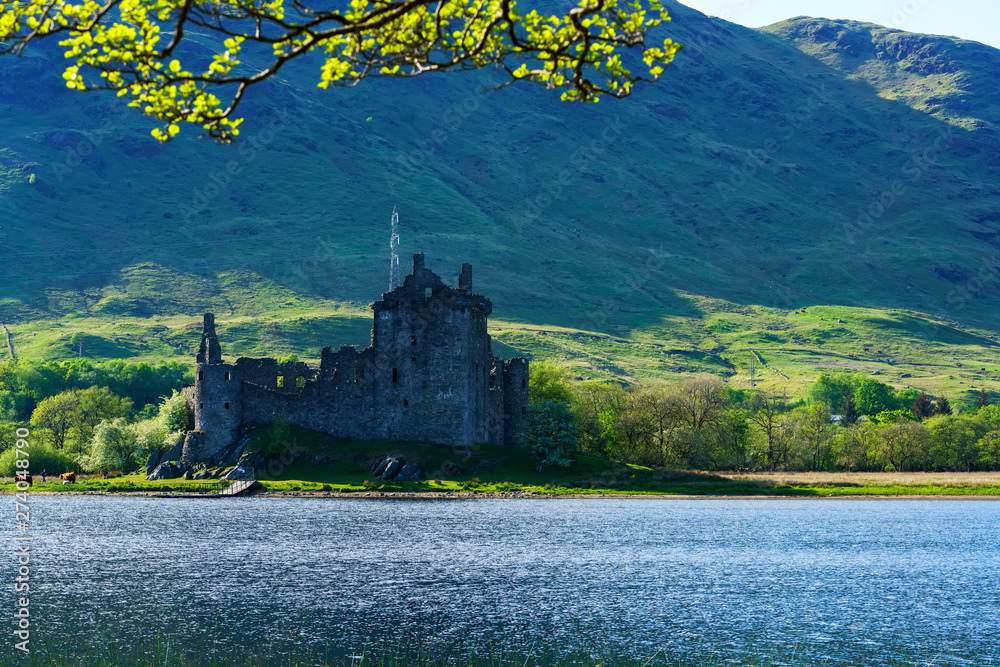 Kilchurn Castle , in the care of Historic Environment Scotland , is a ruined structure on a rocky peninsula at Loch Awe , Argyll and Bute, Scotland