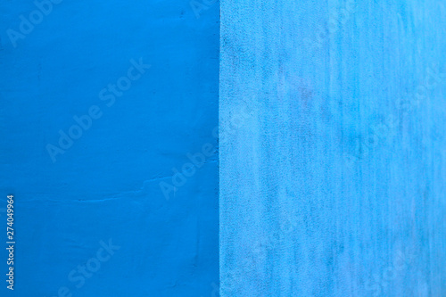 abstract image of a wall of two equal shades of blue