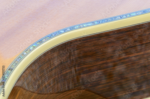 Obraz na plátně Acoustic Guitar detail - inlay detail on edge curve