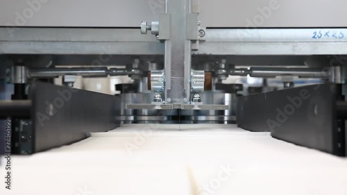 Production of white napkins in factory, close up